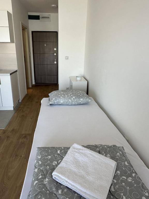 Postel nebo postele na pokoji v ubytování Apartmani Casper