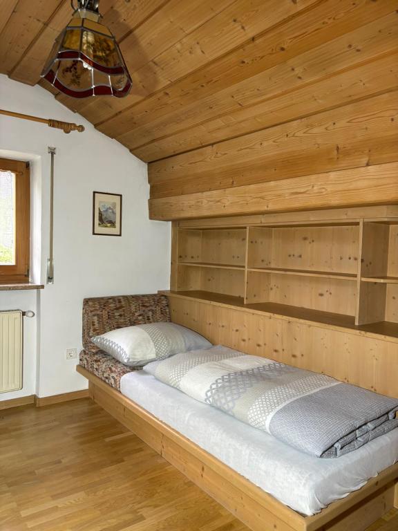 Postel nebo postele na pokoji v ubytování Residence Barbara
