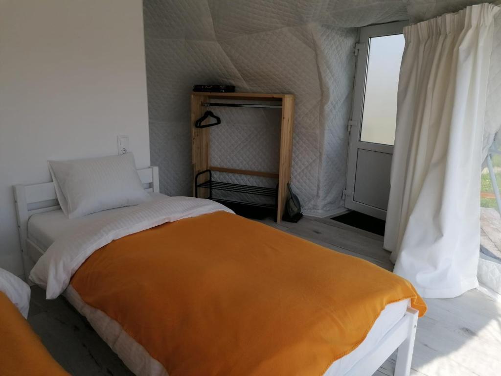 Postel nebo postele na pokoji v ubytování Glamping 4 us
