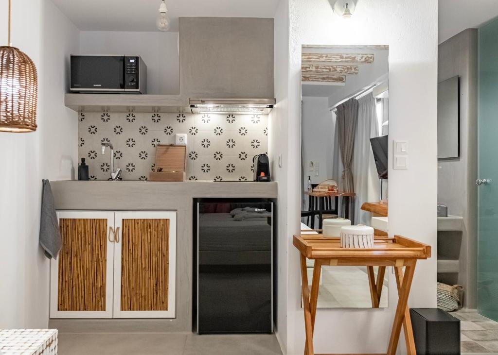 Kuchyň nebo kuchyňský kout v ubytování Aelia Suites