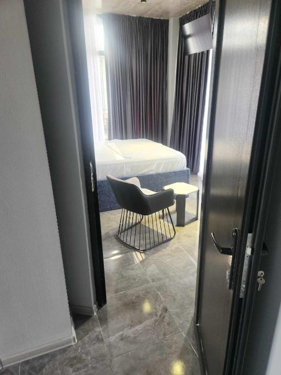 Postel nebo postele na pokoji v ubytování Blue Horizon Apartments