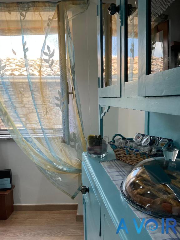 Kuchyň nebo kuchyňský kout v ubytování B&B A Voir