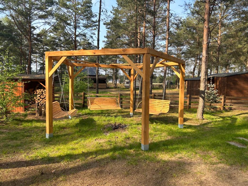 Vonkajšia záhrada v ubytovaní Nowe Domki w Borsku z Balią kąpielową