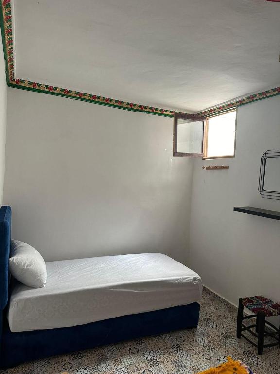 Postel nebo postele na pokoji v ubytování Hostel Tanger Medina