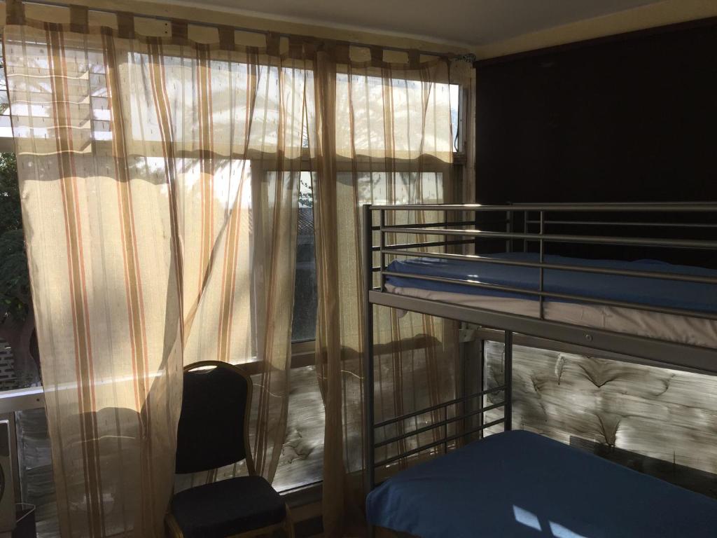 Postel nebo postele na pokoji v ubytování Tenerife Hostel