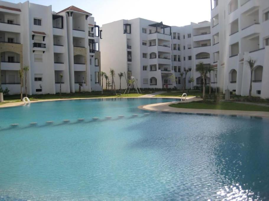 Πισίνα στο ή κοντά στο Appartement moderne vue sur mer assilah marina golf