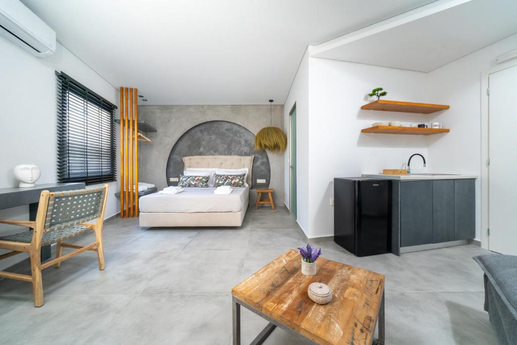 Giường trong phòng chung tại Parilion Suites