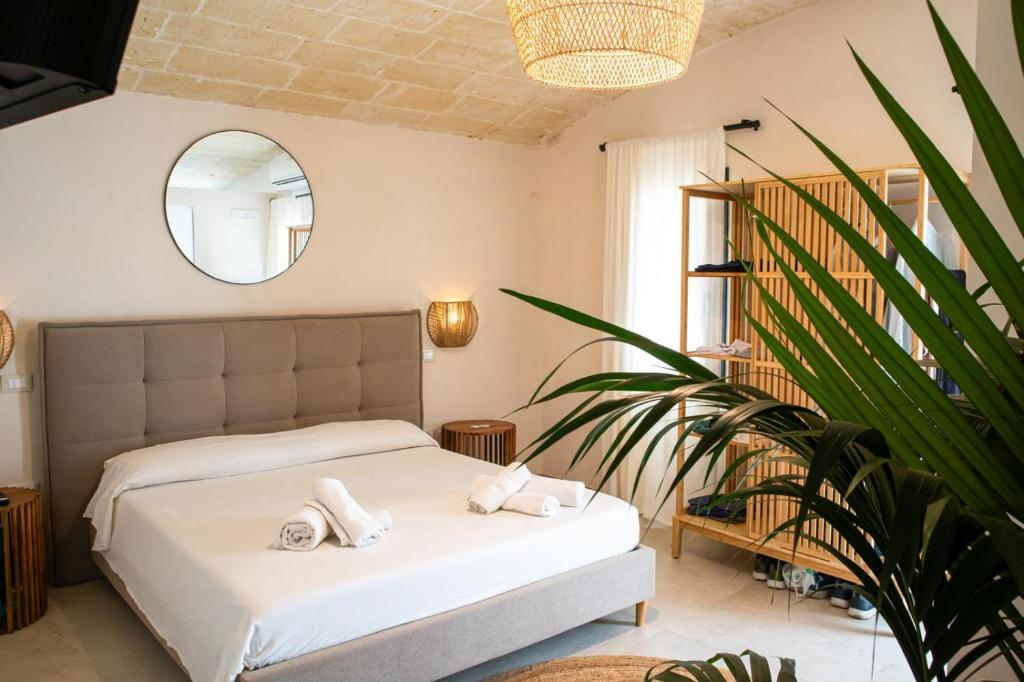 Postel nebo postele na pokoji v ubytování B&B Stellamarina