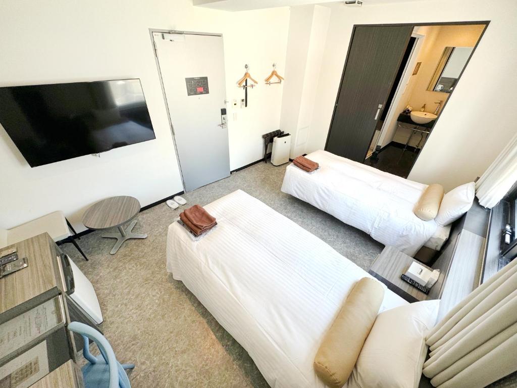 TV a/nebo společenská místnost v ubytování RE Hotel 梅田