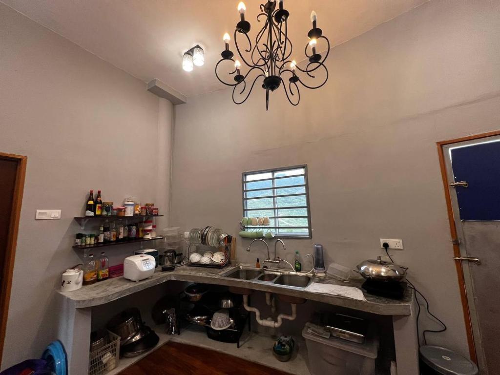Kuchyň nebo kuchyňský kout v ubytování Hakka Villa 客家土楼