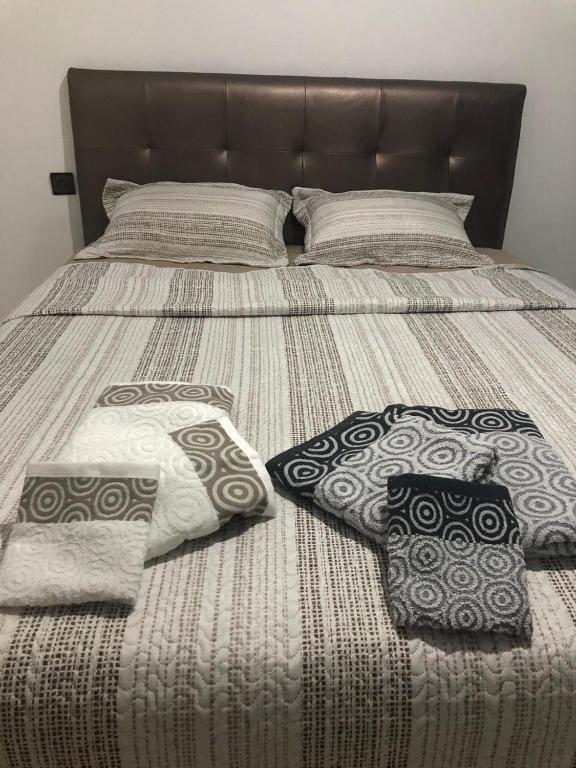 Postel nebo postele na pokoji v ubytování Appartement confortable neuf