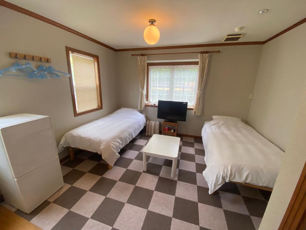 Postel nebo postele na pokoji v ubytování Oli Oli Guesthouse