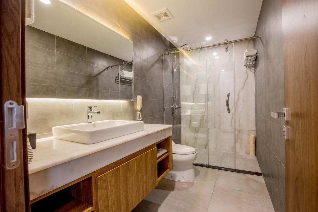 Koupelna v ubytování Le President Hotel