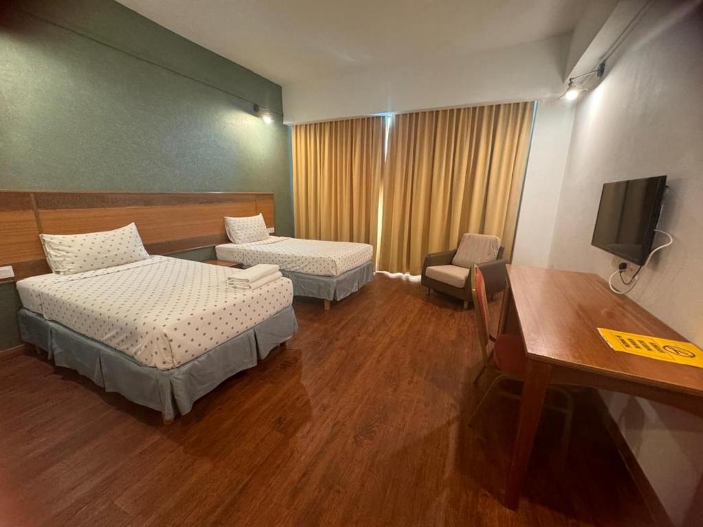 Postel nebo postele na pokoji v ubytování MAYRES HOTEL