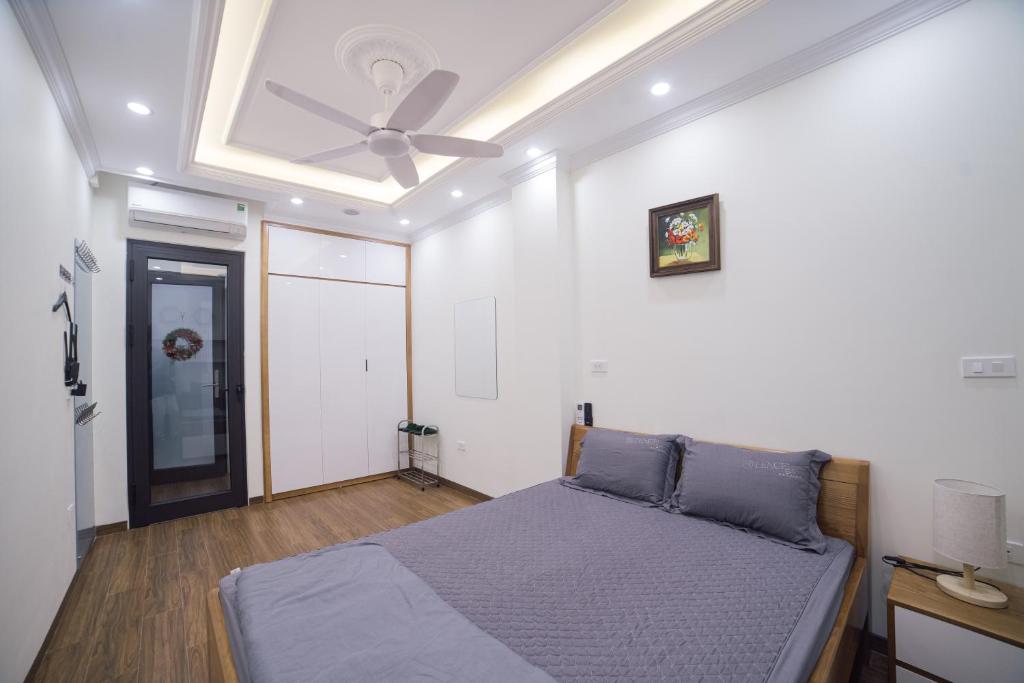 Postel nebo postele na pokoji v ubytování Pho Nang Hotel