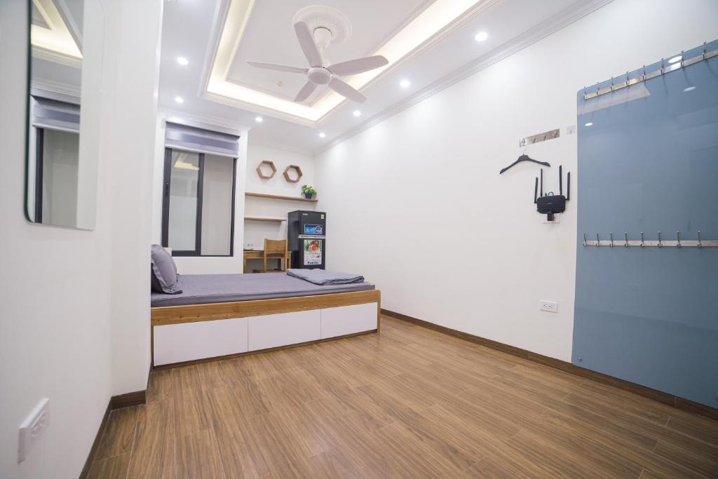 Postel nebo postele na pokoji v ubytování Pho Nang Hotel