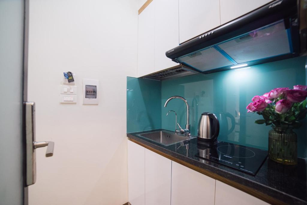 Kuchyň nebo kuchyňský kout v ubytování Pho Nang Hotel