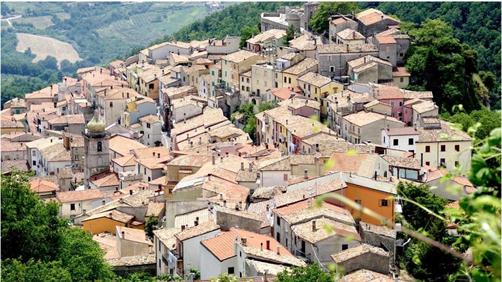 a village on top of a hill with houses at CASA LaCosta in Pettoranello di Molise