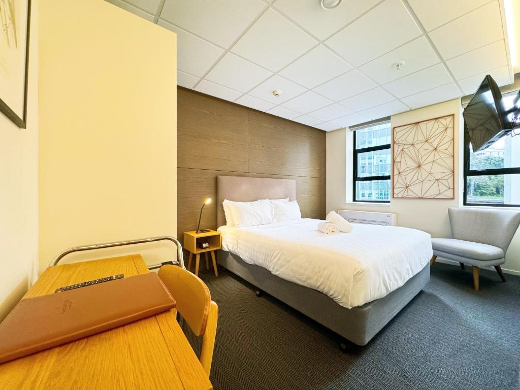 Postel nebo postele na pokoji v ubytování Park Hotel, Lambton Quay