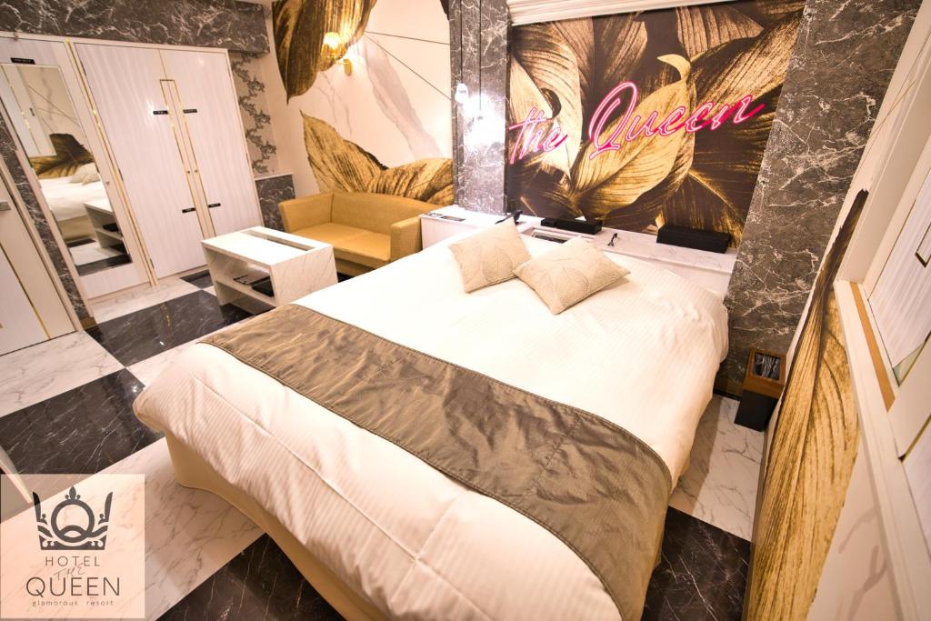 Postel nebo postele na pokoji v ubytování HOTEL the QUEEN