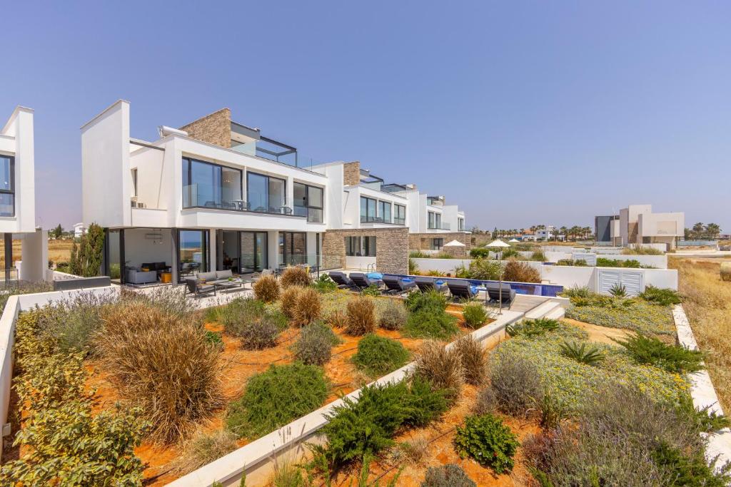 an aerial view of a house with a garden at Villa Pliades in Ayia Napa