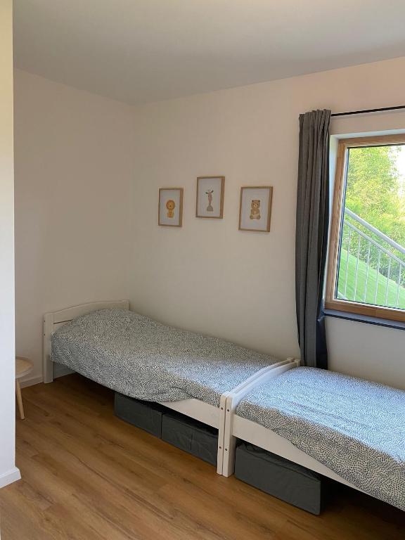 Postel nebo postele na pokoji v ubytování Luxe appartement in Zuid Karinthië