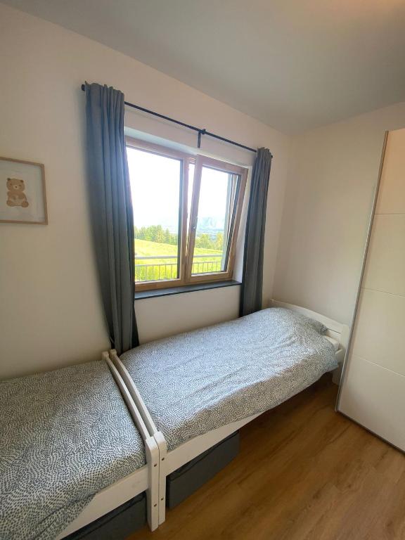Postel nebo postele na pokoji v ubytování Luxe appartement in Zuid Karinthië