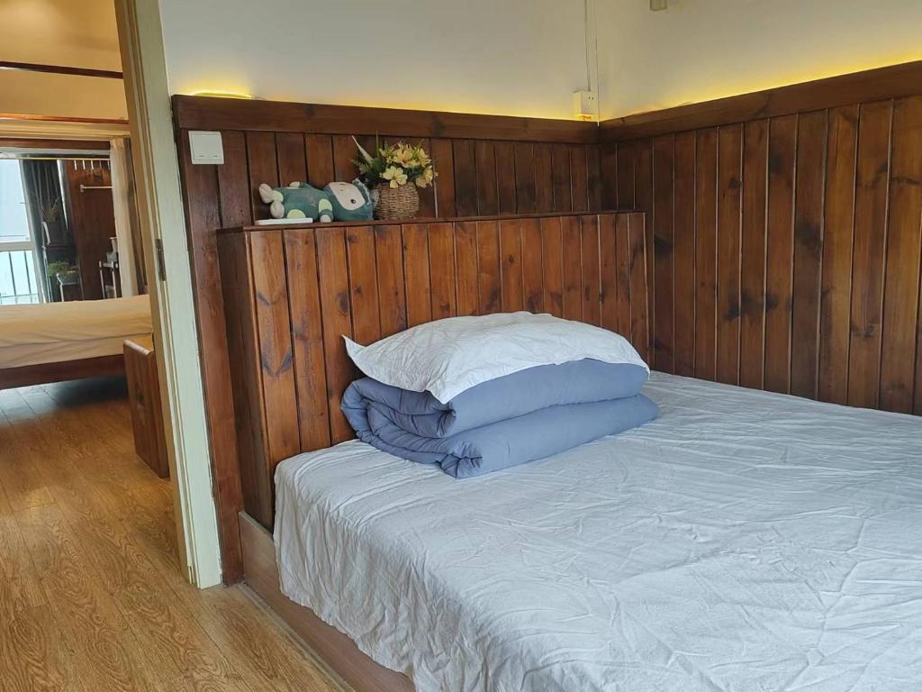 Postel nebo postele na pokoji v ubytování 枕窗听雨Homestay