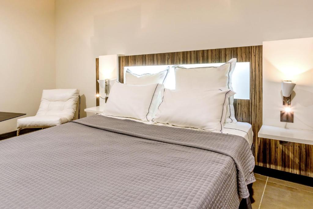 Letto o letti in una camera di Residence Fort Savane