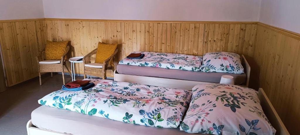 Postel nebo postele na pokoji v ubytování Ubytování U Tajčů