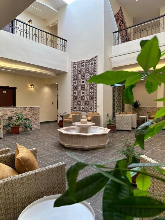 Posezení v ubytování Rumman Hotel