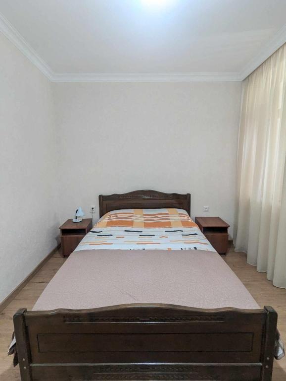 Llit o llits en una habitació de Grimis Villa