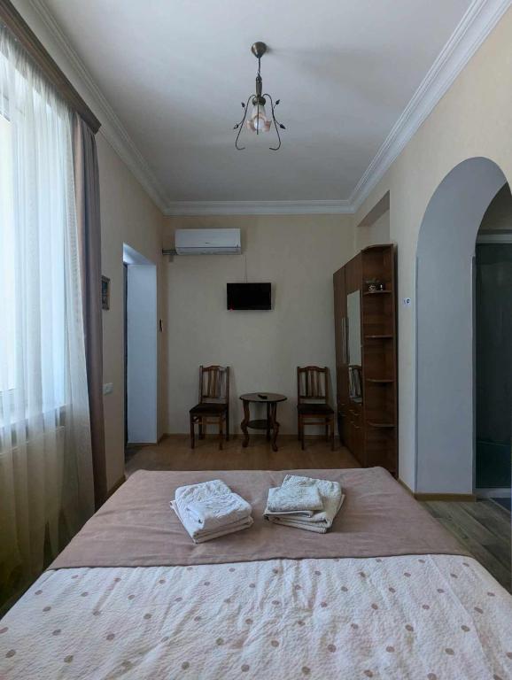 Llit o llits en una habitació de Grimis Villa