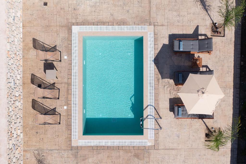 Bazén v ubytování Amora Pool Villas nebo v jeho okolí