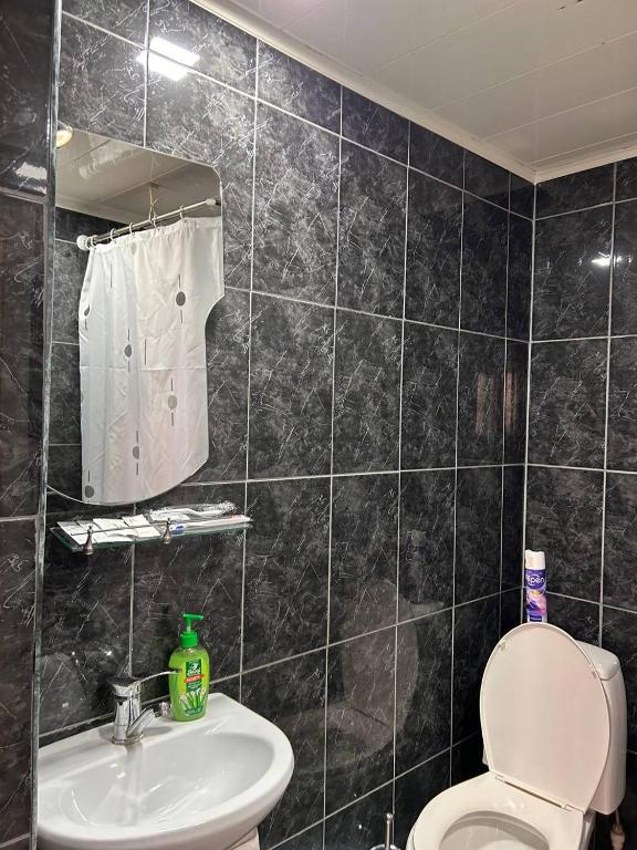 Koupelna v ubytování Nectar hotel