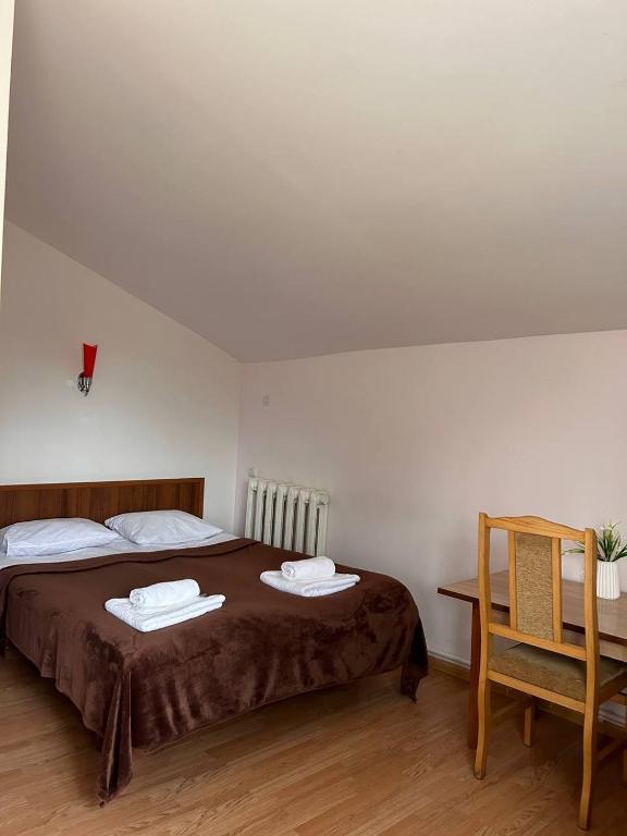 Postel nebo postele na pokoji v ubytování Nectar hotel