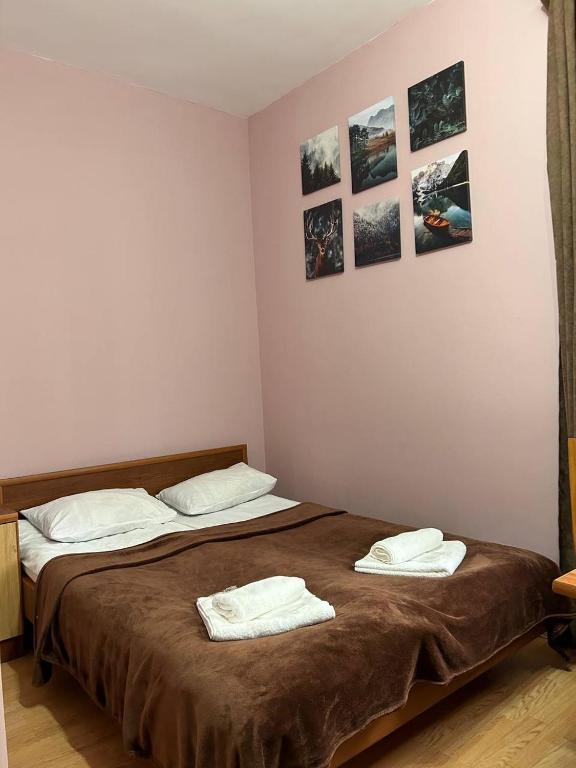 Postel nebo postele na pokoji v ubytování Nectar hotel
