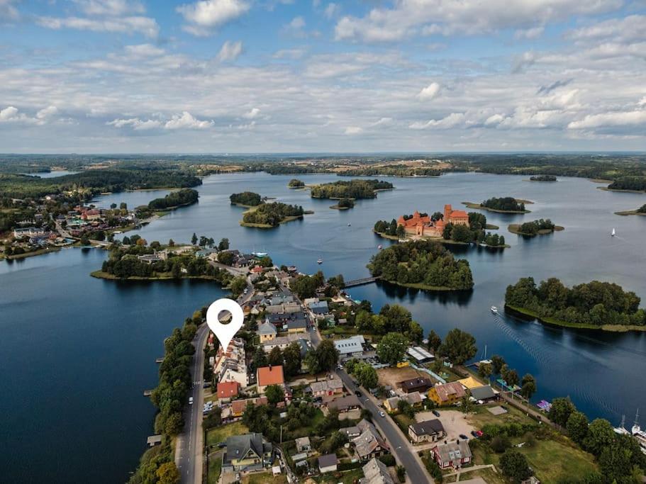 an aerial view of a town on a river at Apartment in Trakai by the lake! in Trakai