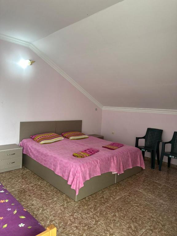 Postel nebo postele na pokoji v ubytování IR Guest House
