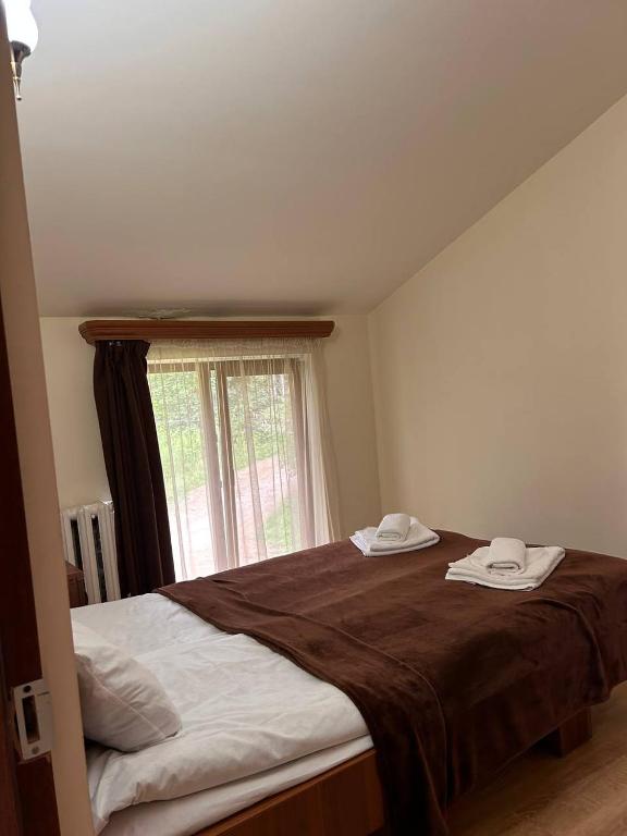 Postel nebo postele na pokoji v ubytování Nectar hotel