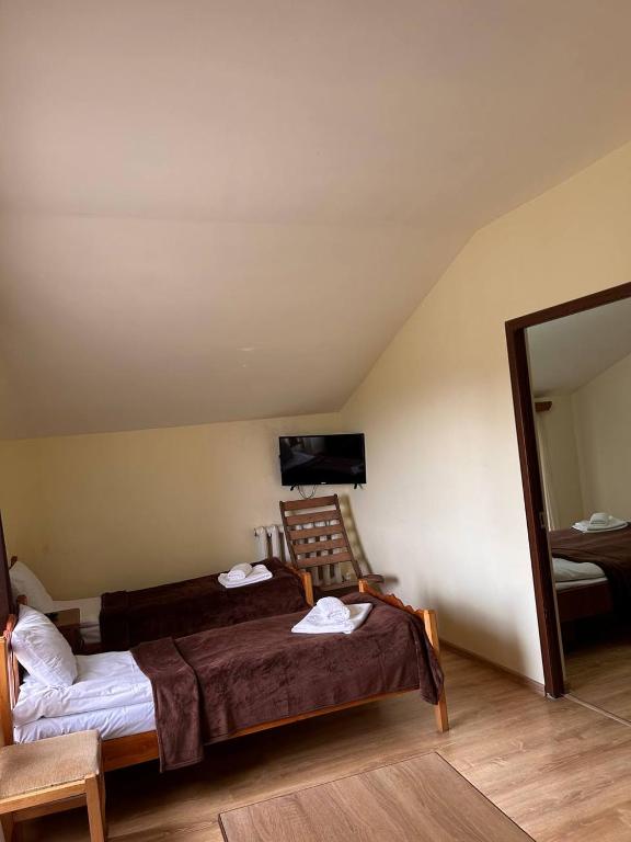 Postel nebo postele na pokoji v ubytování Nectar hotel
