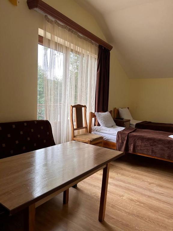 Postel nebo postele na pokoji v ubytování Nectar hotel