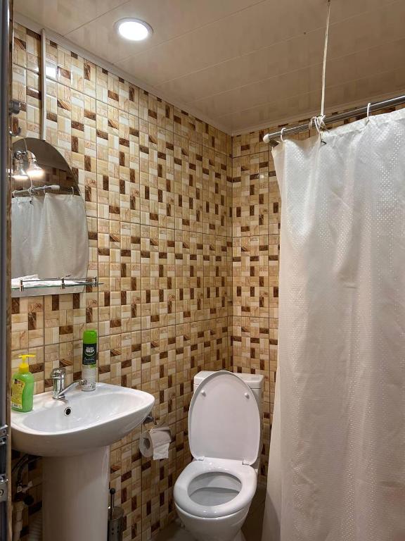 Koupelna v ubytování Nectar hotel