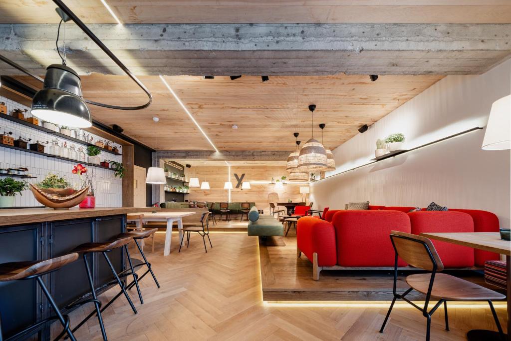 Posezení v ubytování B&B Hotel Zimmerei mit Frühstück