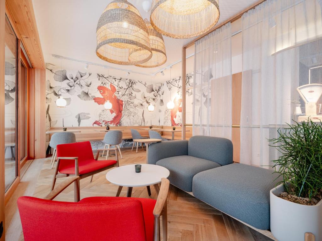 Posezení v ubytování B&B Hotel Zimmerei mit Frühstück