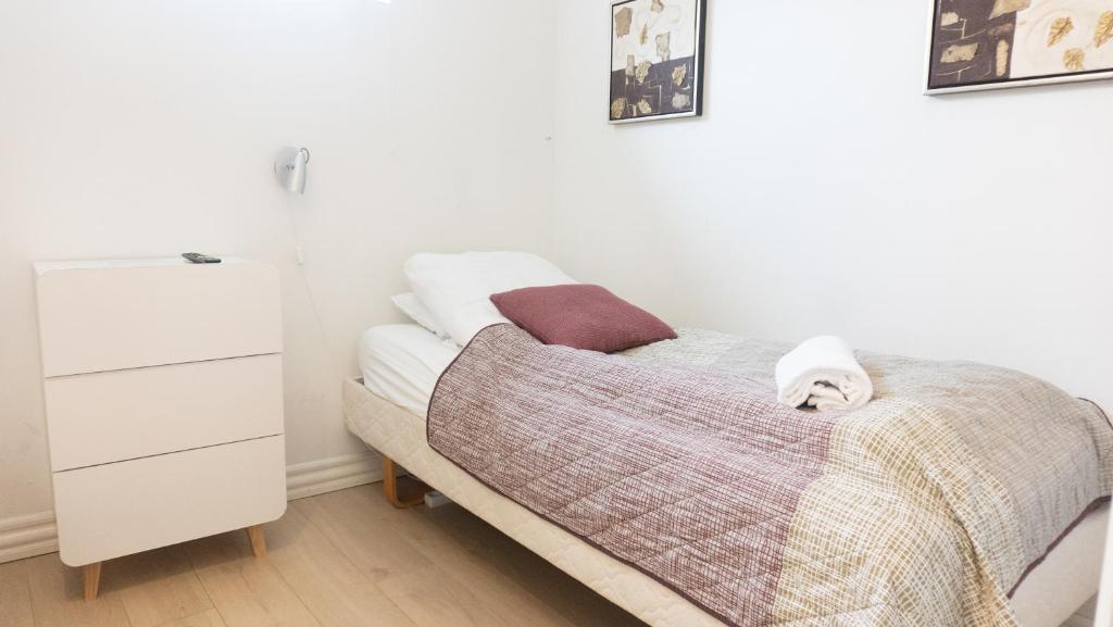 Postel nebo postele na pokoji v ubytování Hilmors Overnatning