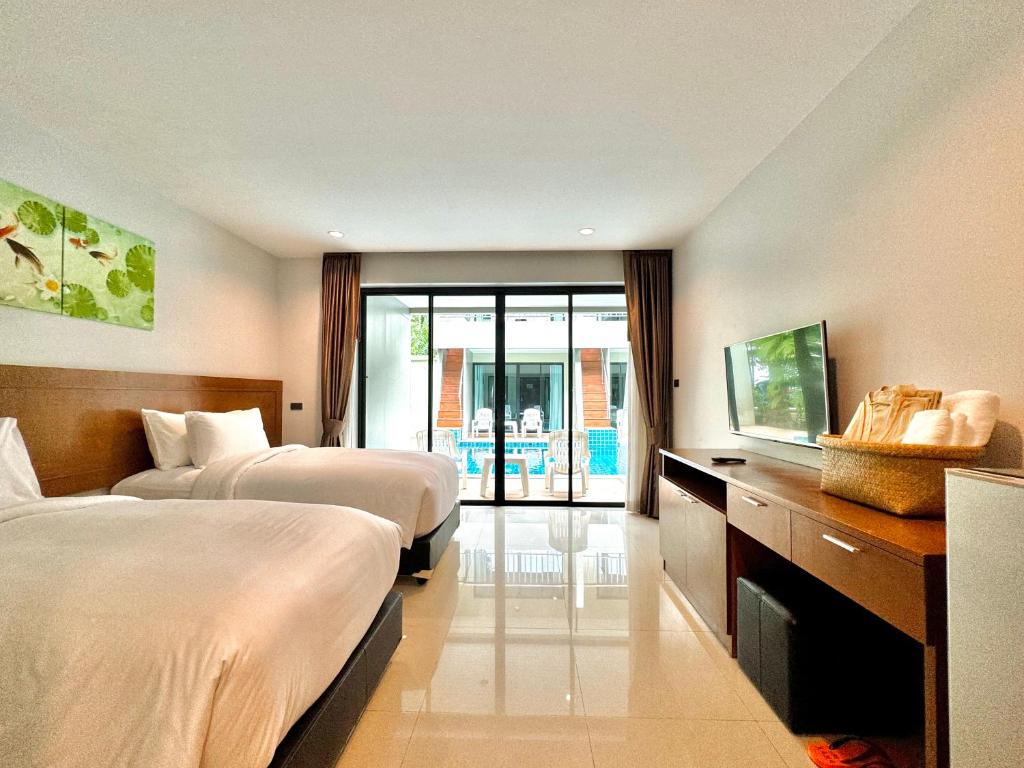 Postel nebo postele na pokoji v ubytování XAYA Pool Access Resort - Phuket
