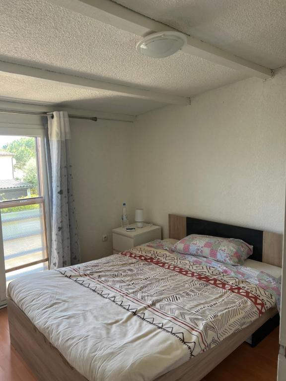 Postel nebo postele na pokoji v ubytování Pavilllon en corse chez Michel