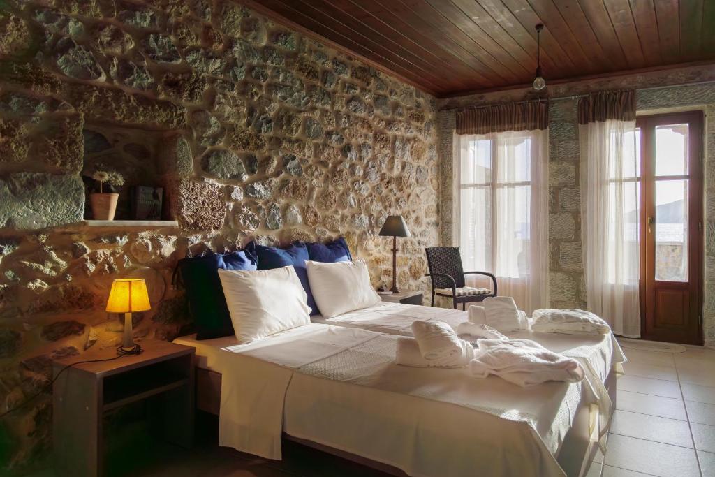 Postel nebo postele na pokoji v ubytování Sun Villa