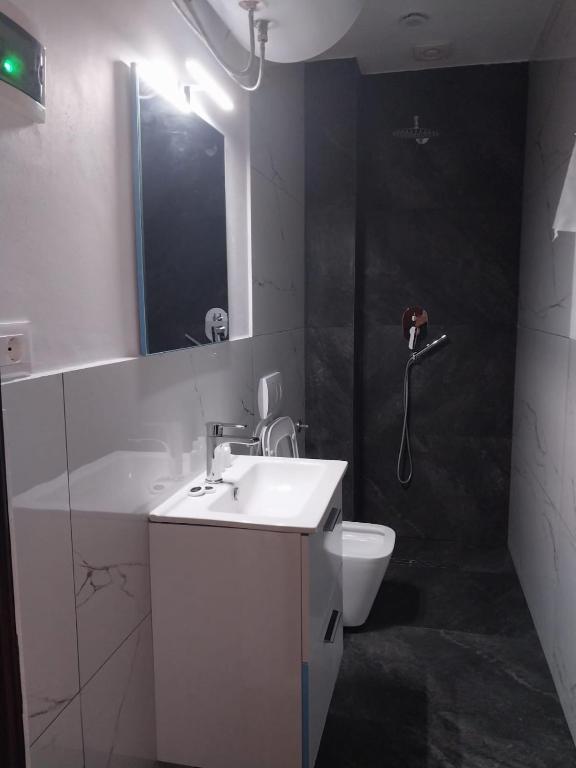 Koupelna v ubytování Hotel Luli City Center